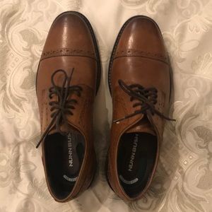 Men’s Size 7 tan leather shoes. Never worn.